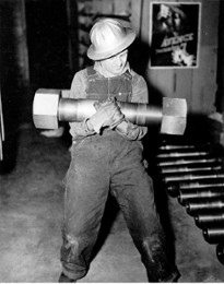 One-hundred, ninety pound nut and bolt, one of 16 used to join sections of the generator shaft of a 75,000 kW generator - Grand Coulee Dam, 1942. This is not Rick Steves One-hundred, ninety pound nut and bolt, one of 16 used to join sections of the generator shaft of a 75,000 kW generator - Grand Coulee Dam, 1942. This is not Rick Steves